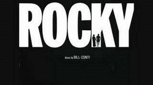 GONNA FLY NOW Lyrics - BILL CONTI | eLyrics.net