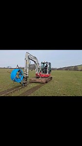 Burying water pipe #mole #moleplough #plough #takeuchi #waterpipe #agri #owenenviro | Owen Enviro