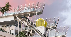 bright yellow funicular breathes new life into neglected 70s hotel in gran canaria