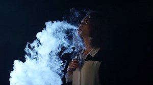 Girl Inhales Exhales Smoke E-cigarette Black Stock Footage Video (100% Royalty-free) 28952269 | Shutterstock
