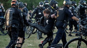 At least 45 arrested after police declare riot at Seattle protests, several officers injured