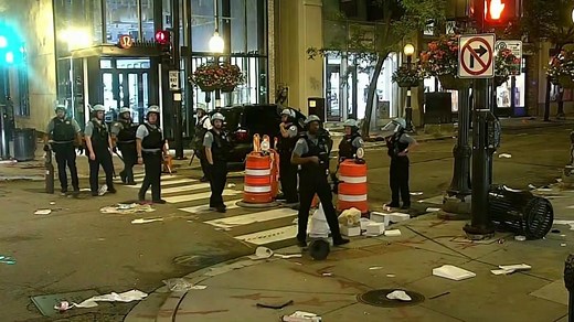 100 arrested, 13 officers injured in Chicago overnight after police shoot man