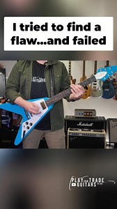 Spoiler alert: this guitar is a winner! From the '70s headstock to the Maui blue finish and Grover tuners, it's got style and quality. The volute on the headstock? Such a cool touch. Just an amazing guitar. Comment “WIN’ now to enter our Les Paul Custom Giveaway! Must also subscribe on YouTube - full video link in comments. SHOP EPIPHONE FLYING V: https://www.zzounds.com/a--3979398/item--EPIEIFV7?siid=378264 #FlyingV #GuitarReview #Guitar #Guitarist #GuitarGear | Play and Trade Guitars