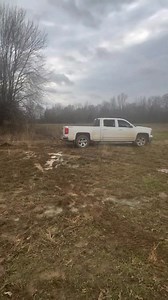 All Chevrolet drivers , ! Tell me why my truck wouldn’t pull him out ? . Well he kept digging it deeper trying to get it out , all because he out here playing 🤣 & than gone call me .! What yall think ? I THINK HE NEED A TRACTOR . And yes i had It in 4wheel drive . Both trucks got mud tires 🛞 #Godisgood #mamapoopoo #bigmama #bigmamakids | Mama_Poopoo