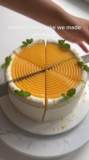 Lemon crepe cake with lemon curd top. #lemoncake #lemoncrepecake #crepecake #crepes #crepescake #lemoncurd #lemoncurdrecipe #lemoncurdcake #recipe #lemoncakerecipe #fyp #viralvideo #viraltiktok | Life Cake