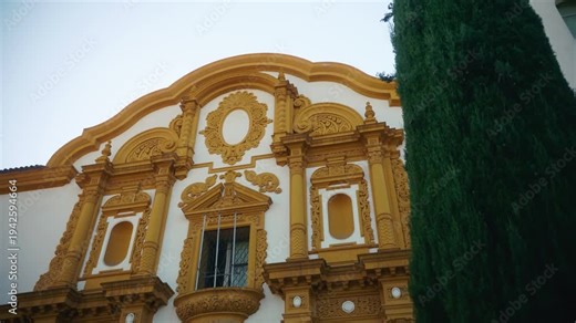 Detailed baroque church facade with sculpted columns and arches