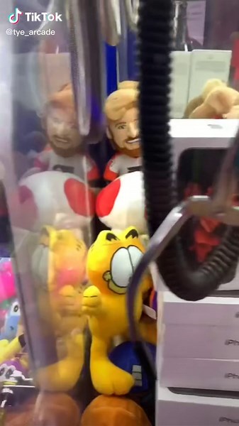 iPhones Inside The Claw Machine Win
