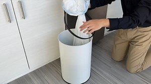 Watch iTouchless 8 Gal White Round Sensor Kitchen Trash Can on Amazon Live