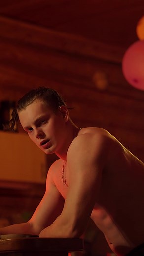 Stylish Indoor Fashion Showcase: Muscular Man's Look