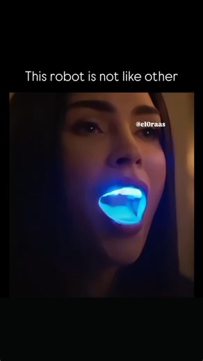 Elora on Instagram: "🤖 Interesting Fact: 🎬The scene is from the 2024 sci-fi thriller movie Subservience, starring Megan Fox as the character Alice. Alice is an advanced domestic android purchased by a father to assist his family. The vivid blue glow captured in the image is caused by a functional ultraviolet (UV) light feature built into the android's system, which she uses to quickly disinfect her mouth by killing bacteria as part of her routine maintenance. This scene is one of the initial m