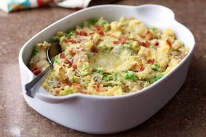 16K views · 76 reactions | Fluffy mashed potatoes with sauteed cabbage and bacon add up to Colcannon - a side dish that we love for pretty much any occasion! https://barefeetinthekitchen.com/irish-colcannon-potatoes-with-bacon-and-cabbage-recipe/ | BarefeetintheKitchen.com | Facebook