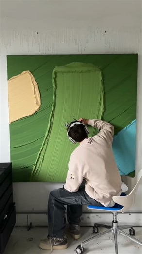 Art Daily Dose on Instagram: "Werner Bronkhorst creates worlds where texture becomes landscape. By spreading thick, sculptural layers of paint across the canvas, he builds abstract surfaces that later transform into tennis and basketball courts, swimming pools, golf courses, open water, and quiet scenes like a lone boat drifting across a vast painted surface. The contrast is the magic. Minimal color fields meet meticulous, hyper-realistic details, inviting viewers to imagine themselves as tiny f