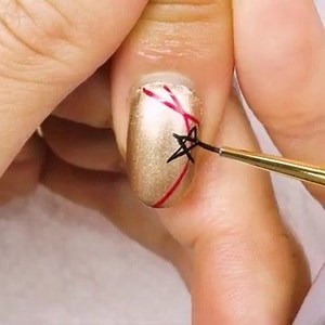 Step into 2020 with star-inspired nail art from Morgan Taylor Champagne & Moonbeams Collection. | NAILS Magazine