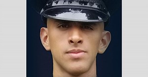 Four charged federally in killing of LAPD officer who was shot while house-hunting