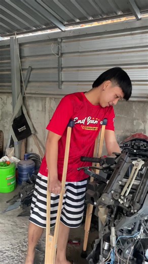 Repairing a Forza 350 Motorcycle in the Workshop