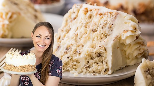 Italian Cream Cake is a southern-style cake is bursting with pecan, coconut, and almond flavors. It’s frosted with a cream cheese frosting and beautifully decorated to make one impressive and ridiculously tasty dessert! Recipe: https://sugarspunrun.com/italian-cream-cake/ | Sugar Spun Run