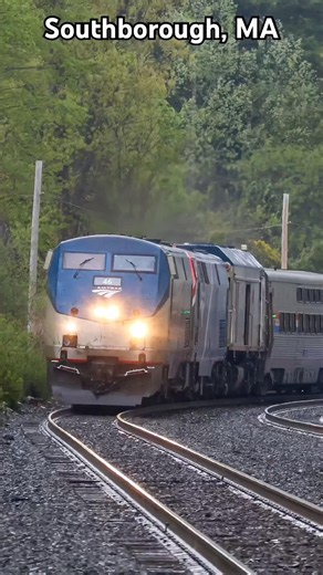Amtrak Lakeshore Limited with a colorful consist through Southborough