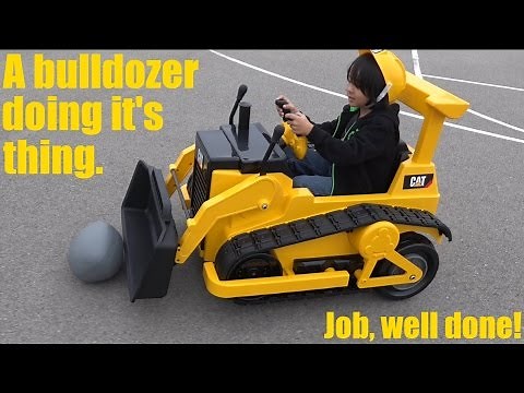 Toy Trucks for Kids: Battery Operated Caterpillar Bulldozer Ride-On at Work