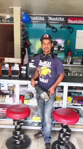 Power Tool Demonstration in a Metalworking Workshop