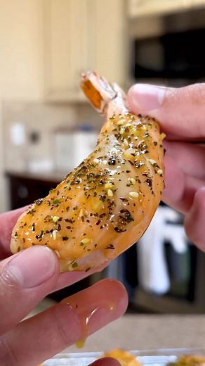 Jason Ortynski on Instagram: "Salmon Wrapped Shrimp (needs a new name) 🦐 Recipe Below: •Thinly slice your salmon filet •Clean your tiger shrimp •Wrap salmon around the shrimp •Season with a seafood rub •Cook at 275° for about 20 minutes •Melt butter with your seasoning •Coat shrimp in butter #jortskitchen #salmon #seafood #littlemermaid #salmonweappedshrimp #fyp"