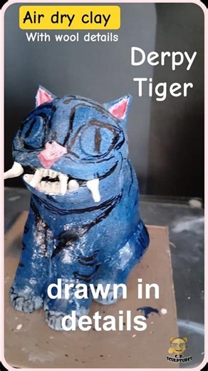 Blue tiger in air dry clay with wool details#airdryclay #skulpture #derpytiger