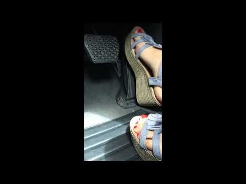 Girlfriend driving BMW in wedges