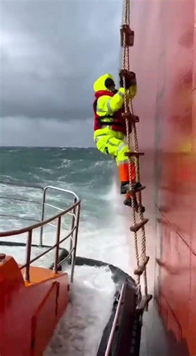 Terrifying Leap: Maritime Pilot Battles Massive Waves!