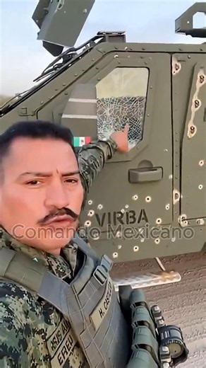 General Shows Military Truck After Battle