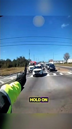 A fake motorcycle cop tried to stop a real cop