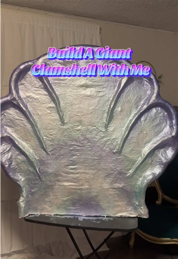 My first paper mache project, a 3.5ft clamshell 😳 Definitely not perfect but should be great for photos 🙌🏼 Everything except the paint and brackets are from dollar tree 🤑 The brackets have been chillin in my garage for years so those were free imo 🤷🏻‍♀️ and the paper was all free so really I only spent money on the paint and I count that as a budget win 🥳 #papermache #clamshellprop #diyclamshell #giantclamshell #artist