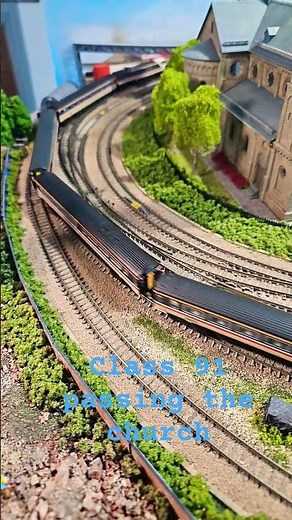 N Gauge class 91 passing the church