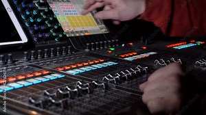 Sound equipment . The operator works at the sound mixing panel in a show. professional music equipment