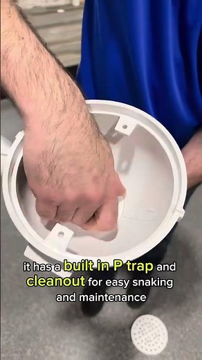 Floor drain with a built-in P-trap and cleanout