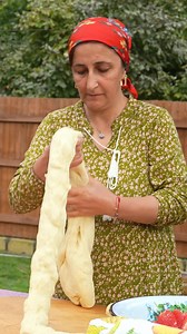 Tender pastry baked over open fire, brushed with love. A delightful tradition in every bite. #OutdoorCooking #OpenFireBaking #TraditionalRecipe #Cooking | SV Stories