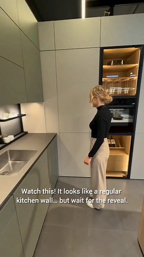 This looks like a simple kitchen wall… until it opens! A hidden pantry with clean shelves, soft lighting, and seamless design — perfect for modern homes. Would you try this in your kitchen? 👀✨ #fblifestyle #KitchenHacks #Christmas #HandmadeDecor #christmasdecor #HiddenPantry #KitchenDesign #ModernHomes #InteriorInspiration | Aluminium Glass Design