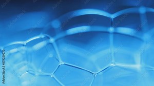 Blue water bubbles in macro, connection of bubbles in macro, cell from liquid, molecules connection