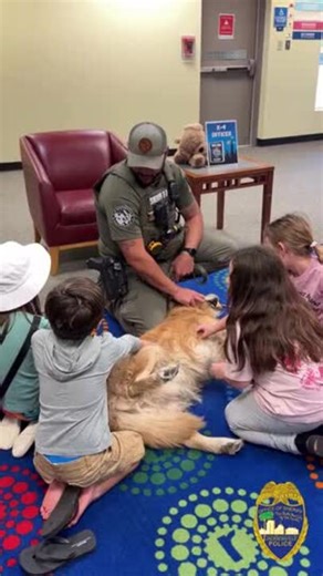 Police Dog Takes Break for Belly Rubs From Kids