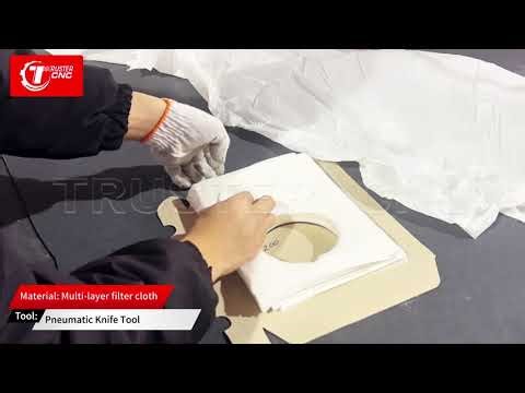 Multi-layer filter cloth cutting machine with pneumatic knife tool