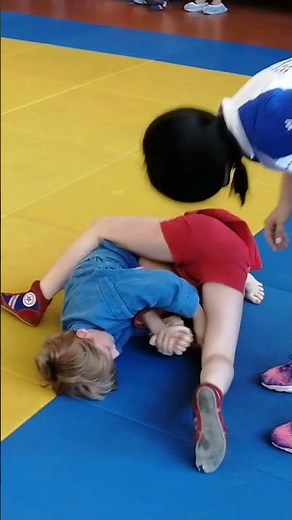 Wrestling Kids. Artem in blue.