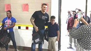 “We packing”- Dustin Poirier shows off his haul of backpacks meant for charity