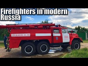 MODERN RUSSIA. Russian firefighters and the Soviet era ZIL-131 fire truck