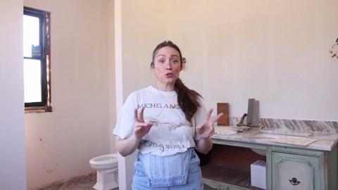 Design a bathroom with charming wallpaper