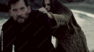 Man running away from angry female vampire slow motion green color correction