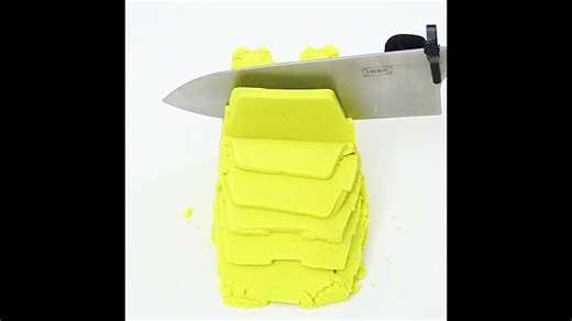 Slicing yellow castle sand ASMR