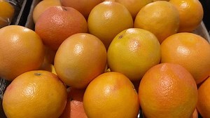 Grapefruits Displayed By Greengrocer Tracking Shot Stock Footage Video (100% Royalty-free) 4001034381 | Shutterstock