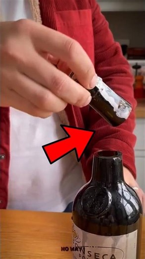Why Experts Cut the Neck of Old Wine Bottles