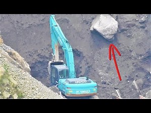 Excavator Digging Loading Screening Sand Into Dump Truck Kobelco SK200