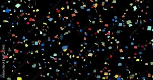 Confetti falling on black background