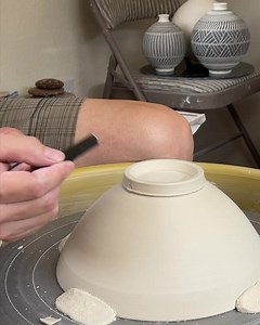 613. Using the combination of a spinner and a plexiglass disc (invented by Hsin-Chuen Lin) to compress a bowl so that one can trim all the way toward the rim without flipping over. Watch the detail on my YouTube channel: https://www.youtube.com/watch?v=EMQrguOXjgI&t=5s | Hsin-Chuen Lin Ceramics