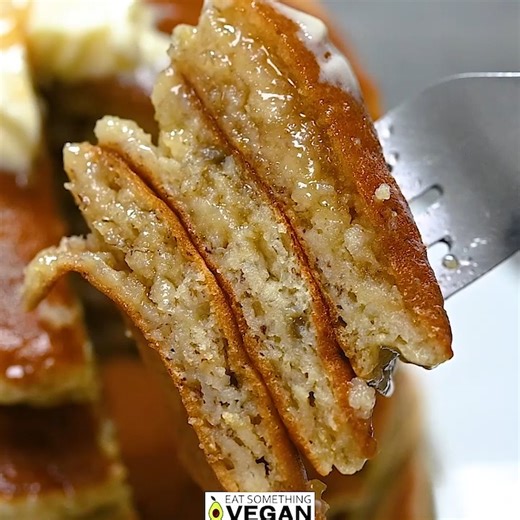 These Vegan Banana Pancakes are soft, fluffy, and made with simple pantry staples. Perfect for cozy mornings or when you're craving something sweet — without the fuss. Once you try them, you’ll want them every weekend! #VeganPancakes #BananaPancakes #EasyBreakfast #PlantBasedRecipes #CozyEats #WeekendVibes #VeganBrunch | Eat Something Vegan
